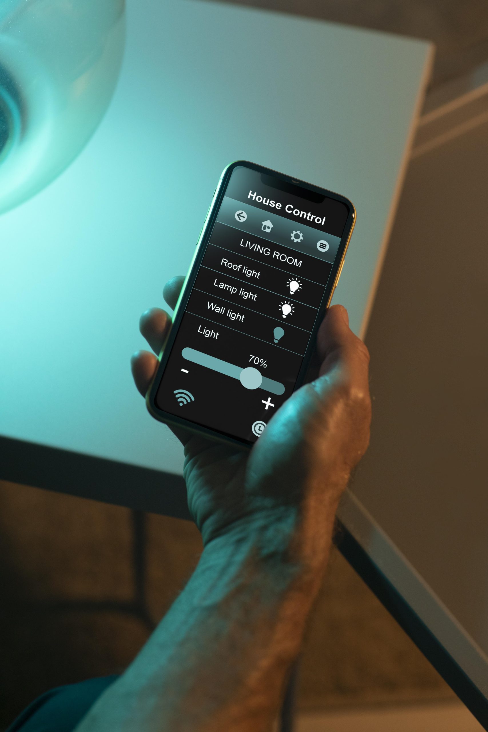 man-using-smartphone-his-automated-home